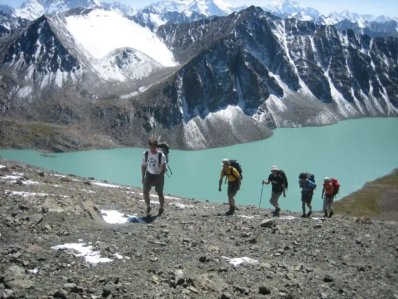 tourists rise from the mountain lake Ala Kul